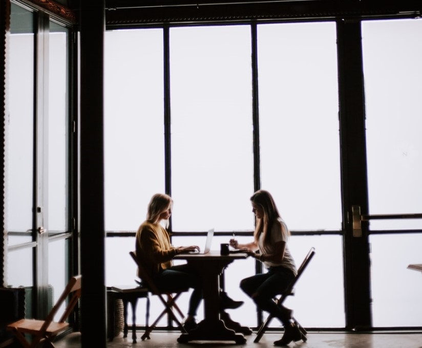 PI Private Investigation Two Women At Table
